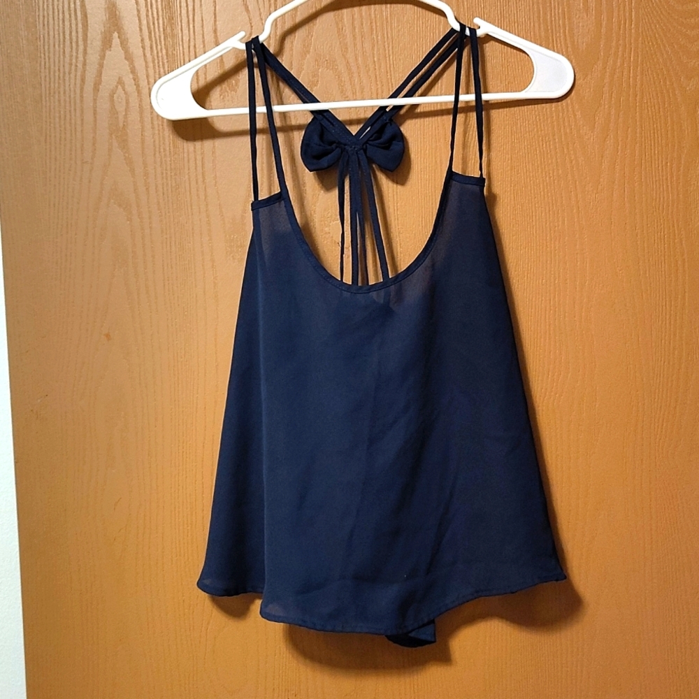 Shear tank top with bow cross back